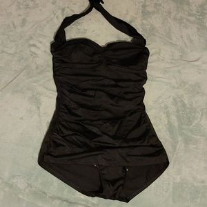 Black one piece bathing suit.